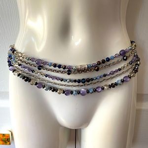 White House Black Market chain belt. Lots of blues. Fits small or medium.